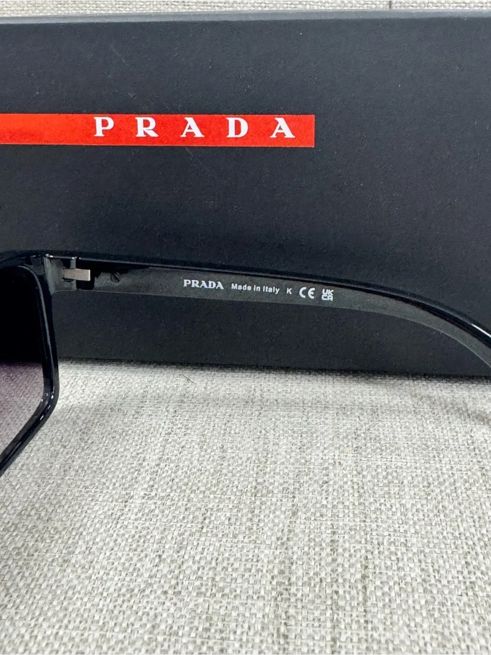 Prada Black Sunglasses with Dark Gray Lenses